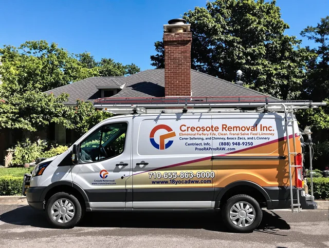 Cheshire Chimney Sweep technician removing creosote safely in Cheshire, CT